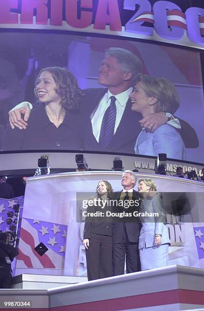 President Bill Clinton and his family at the end of his speech at the Staples Center during the DNC National Convention in Los Angeles California.