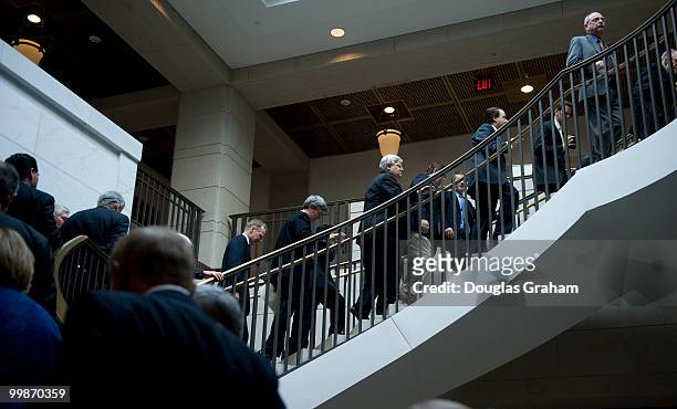 Members from both the House Democratic and Republican Conference's head out of their morning meetings in the CVC basement of the U.S. Capitol. March...