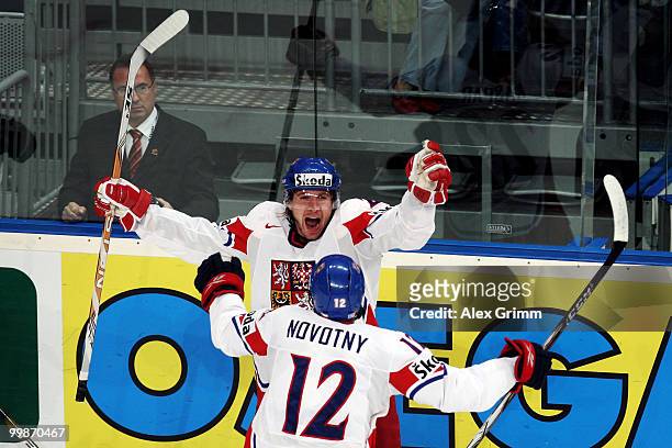 Lukas Kaspar of Czech Republic celebrates his team's first goal with team mate Jiri Novotny during the IIHF World Championship group F qualification...