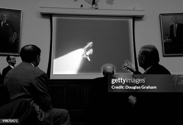 LtoR Tom DeLay, Veron Ehlers, Gene Green and many other members of the House of Representatives watch during the launch viewing of the Space Shuttle...