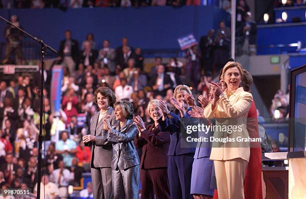 The eight standing female senators lined up for the 2004 Democratic National Convention in Boston Massachusetts. Dianne Feinstein, Barbara Boxer,...