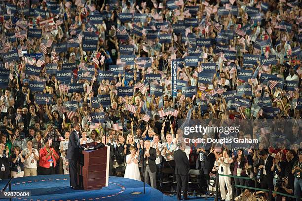 Barack Obama addresses the crowd during his acceptance of the Democratic presidential nomination at Invesco Field at Mile High at the 2008 Democratic...