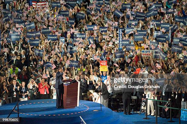 Barack Obama addresses the crowd during his acceptance of the Democratic presidential nomination at Invesco Field at Mile High at the 2008 Democratic...