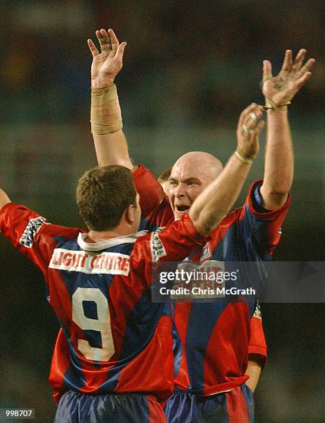 Ben kennedy of the Knights celebrates with Danny Buderus after defeating the Sharks during the NRL Preliminary final match between the Newcastle...