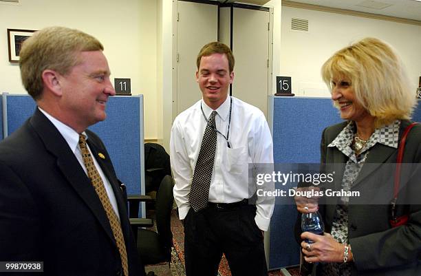 Lynne Crow, chief advisor to the Chairman talks with her boss Robert W. Ney, R-OH., at the New Member Service Center.