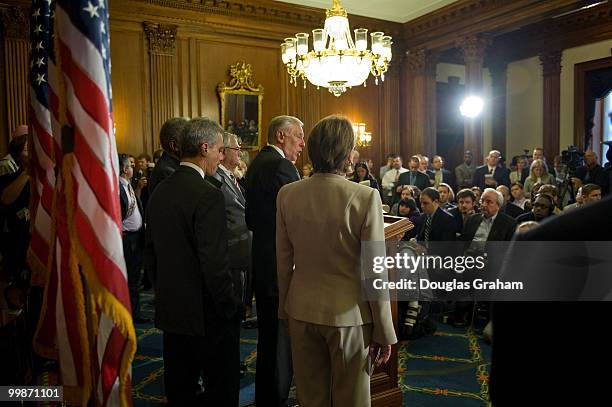 Speaker of the House Nancy Pelosi, D-CA., Democratic Conference Chair Rahm Emanuel, D-Ill., Majority Leader Steny Hoyer, D-MD., and others talk with...