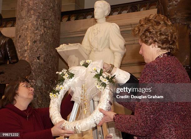 Beverly Robinson and Merry Lee Powell of the Illinois State Society of Washington during a wreath laying ceremony to celebrate the 100th Anniversary...