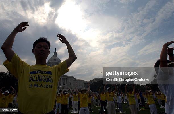 Falun Gong practitioners during a rally to commemorate the fourth anniversary of China's persecution against Falun Gong. The rally was held on the...