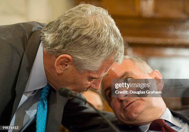 Chuck Hagel, R-Ne., and Jack Reed, D-RI., talk during the Senate Banking, Housing and Urban Affairs Committee, full committee hearing on the Federal...