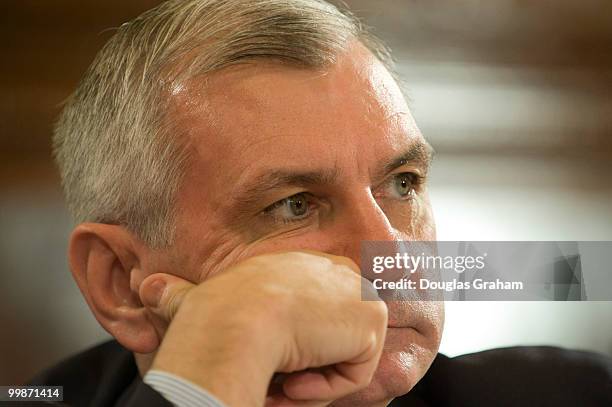 Jack Reed, D-RI., listens to Federal Reserve Board Chairman Ben Bernanke as he testified before the Senate Banking, Housing and Urban Affairs...