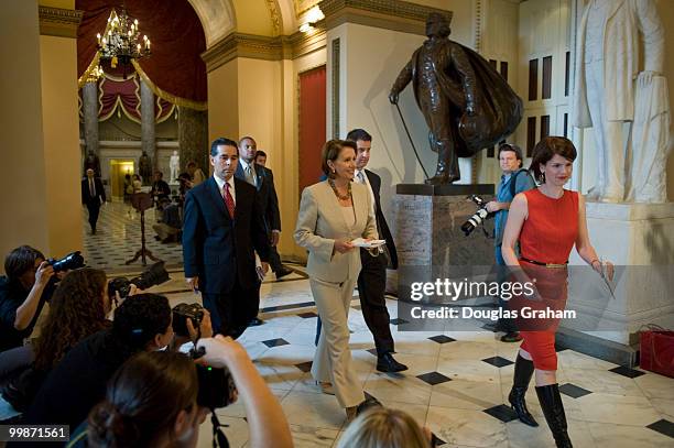 Speaker of the House Nancy Pelosi, D-CA., makes her way through Will Rogers Corridor on the way to the vote on the financial bailout plan at in the...