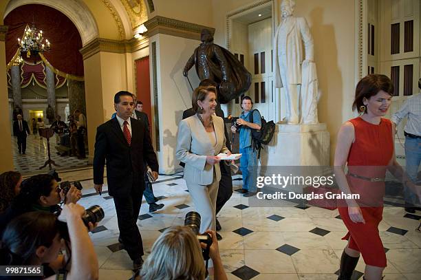 Speaker of the House Nancy Pelosi, D-CA., makes her way through Will Rogers Corridor on the way to the vote on the financial bailout plan at in the...