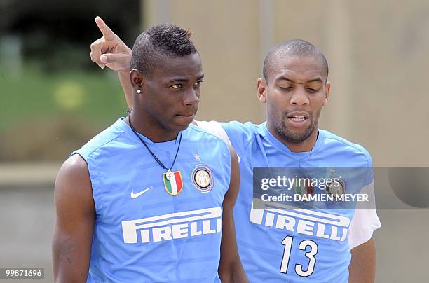 Inter Milan's forward Mario Balotelli and Brazilian defender Maicon attend a training session at the Inter Milan training center in Appiano Gentile...