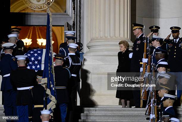 Former first lady Betty Ford waits at the top of the steps to the U.S. House of Representatives waiting to escort the remains of her husband, former...