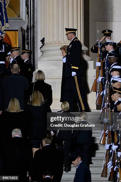 Former first lady Betty Ford and her family escort the remains of her husband, former U.S. President Gerald R. Ford, into the U.S. Capitol Rotunda on...