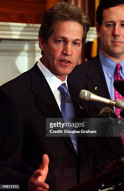 Norm Coleman, D-Minn., during a news conference to call upon President Bush and the State Department to free up authorized funding for the Iraqi...