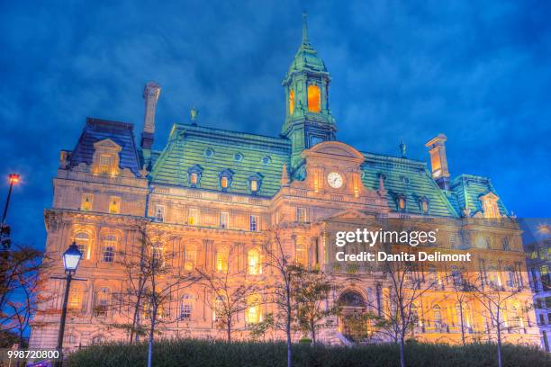 facade of hotel de ville, vieux-montreal, quebec, canada - vieux ストックフォトと画像