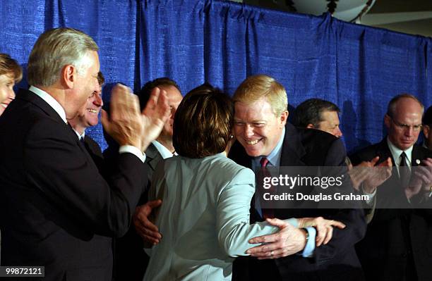 Richard "Dick" Gephardt, D-MO., hugs Democratic Leader Nancy Pelosi, D-CA., during a press conference in which he received the endorsement of the...