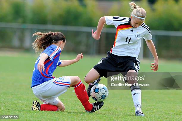 Celina Hunestauth fights for the ball during the U16 women international friendly match between France and Germany at Parc des Sports stadium on May...