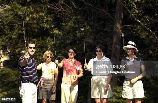 Ben Zatz the asst. Golf pro helps lobbyist Mary Kenkel, Hena Shaw, Janet Sena and Julia Weller during the Women's Networking Forum' was learning how...
