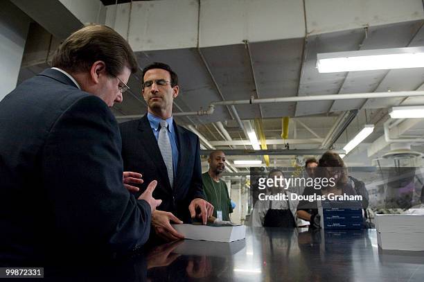 Public Printer of the United States Bob Tapella and Office of Management and Budget Director Peter Orszag inspect the production run at GPO's plant...