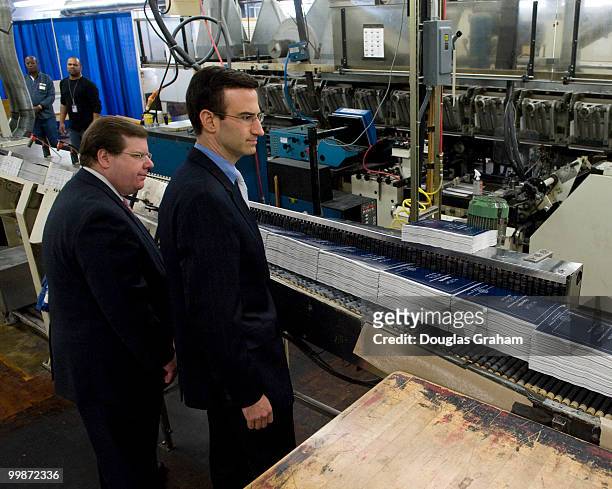Public Printer of the United States Bob Tapella and Office of Management and Budget Director Peter Orszag inspect the production run at GPO's plant...