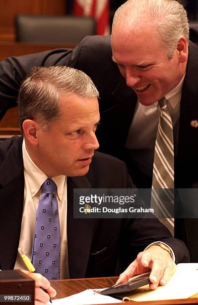 Steve Israel, R-NY, and Joseph Crowley,R-NY, talk before the start of the hearing to satrt on the monetary policy report full committee hearing on...