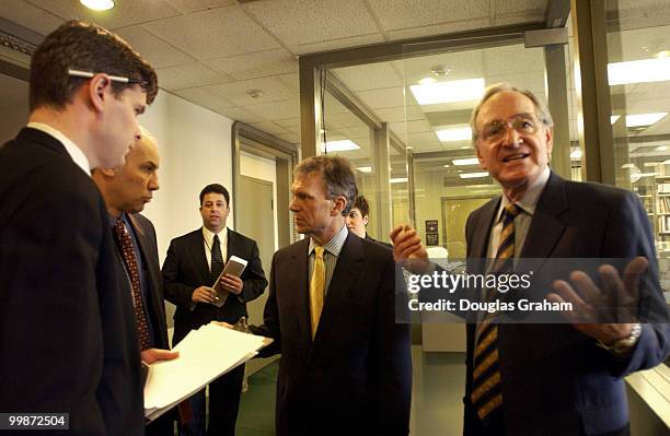 Tom Daschle, D-SD, and Tom Harkin, D-IA., talk outside of the Senate Radio and TV Gallery before the start of the press conference on the economy and...