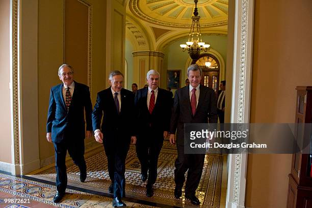 Tom Harkin, D-IA., Senate Majority Leader Harry Reid, D-NV., Chris Dodd, D-CT., and Max Baucus, D-MT., head to a press conference in the U.S. Capitol...