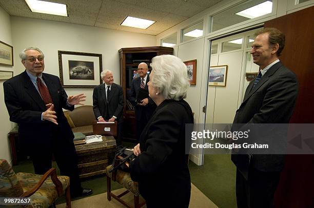 Sheldon Cohen, Don Alexander, Larry Gibbs, and Margaret Richardson talk before the start of the closed meeting to discuss the American "tax gap" with...