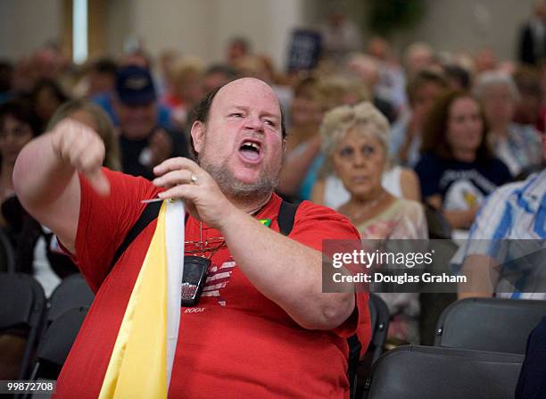 Brian Rieck shouts his displeasure with a answer that Rick Boucher, D-VA., gave during a town hall meeting on health care at the Southwest Virginia...