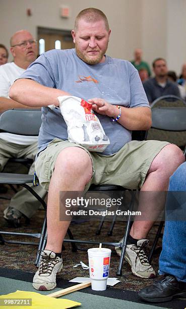 Billy Benson enjoys his McDonald's lunch during the 3 hour long town hall meeting on health care hosted by Rick Boucher, D-VA., at the Southwest...