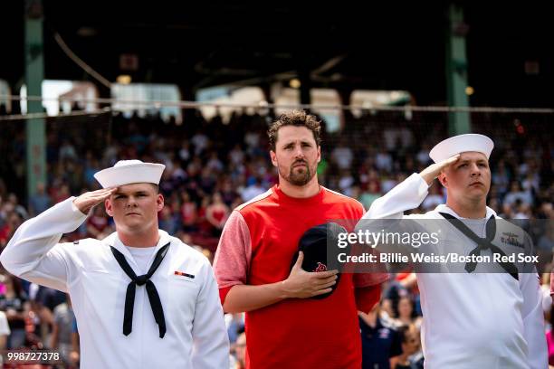 Heath Hembree of the Boston Red Sox greets members of the Navy before a game against the Toronto Blue Jays on July 14, 2018 at Fenway Park in Boston,...