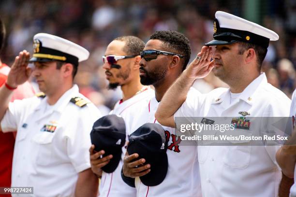 Mookie Betts and Jackie Bradley Jr. #19 of the Boston Red Sox stand with members of the Navy before a game against the Toronto Blue Jays on July 14,...