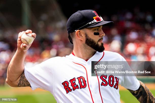 Blake Swihart of the Boston Red Sox warms up before a game against the Toronto Blue Jays on July 14, 2018 at Fenway Park in Boston, Massachusetts.