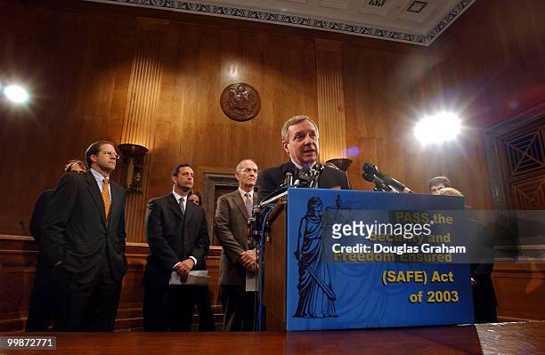From left, Sens. John Sununu, R-N.H., Russell Feingold, D-Wis., Larry Craig, R-Idaho, and Richard Durbin, D-Ill., appear at a news conference to...