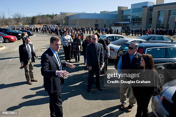 Mark Warner, D-VA., works the line of over 4000 attendees of the federal job fair at the University of Mary Washington's Stafford Campus. The job...
