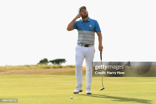 Tyrrell Hatton of England reacts to a missed putt on hole thirteen during day three of the Aberdeen Standard Investments Scottish Open at Gullane...