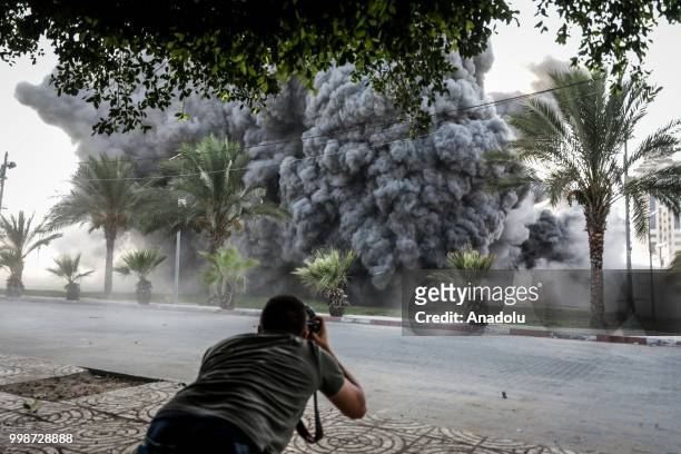 Smoke rises after Israeli fighter jets pounded Al Katiba region in Gaza City, Gaza on July 14, 2018.