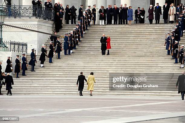 President Barack Obama and First lady Michelle Obama return to the U.S. Capitol after waving good bye to former President George W. Bush and former...