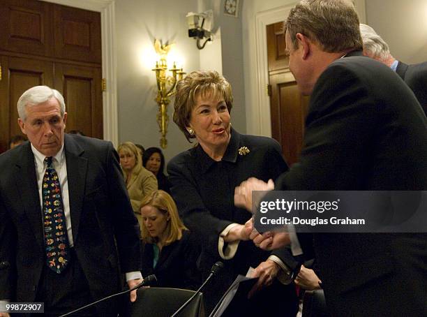 Elizabeth Dole, R-N.C.; is greeted by Mike McIntyre, D-N.C.and Frank Wolf, R-Va. During the full committee hearing on H.R.1294, the "Thomasina Jordan...