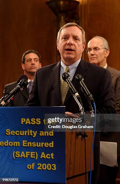 From left, Sens. Russell Feingold, D-Wis., Richard Durbin, D-Ill., and Larry Craig, R-Idaho, appear at a news conference to introduce legislation,...