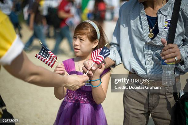 Crowds where estimated at or vary near 100,000 people on the National Mall to march for immigration reform at the same time the House health care...