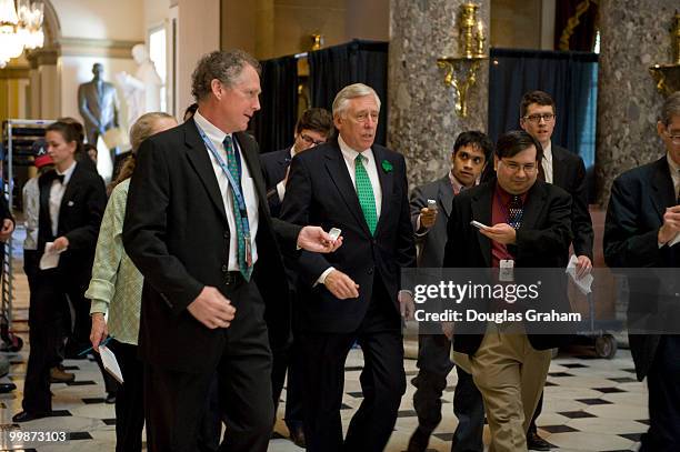 Majority Leader Steny Hoyer, D-MD., talks with reporters as he makes his way through Statuary Hall to the Speakers office in the U.S. Capirol. March...