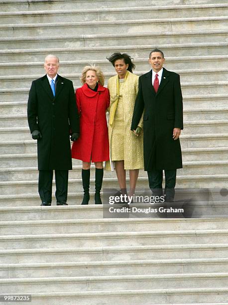 Vice President Joe Biden and his wife Jill, First lady Michelle Obama and President Barack Obama after the 56th inauguration on the East Front of the...