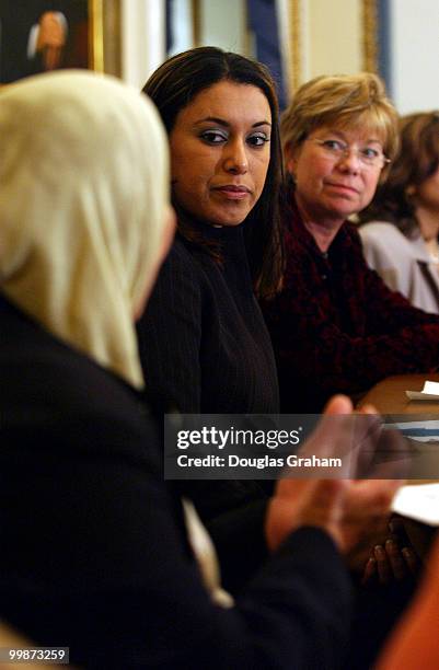 Sabria and Esra Naama talk with the media in the House Rules Committee meeting room in the U.S. Capitol about their personal storys of suffering...