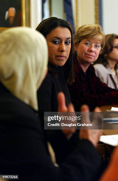 Sabria and Esra Naama talk with the media in the House Rules Committee meeting room in the U.S. Capitol about their personal storys of suffering...