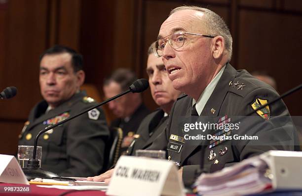 Lt. Gen. Ricardo Sanchez, commander, Multi-National Force-Iraq; Gen. John Abizaid, commander, U.S. Central Command and Gen. Geoffrey Miller, deputy...