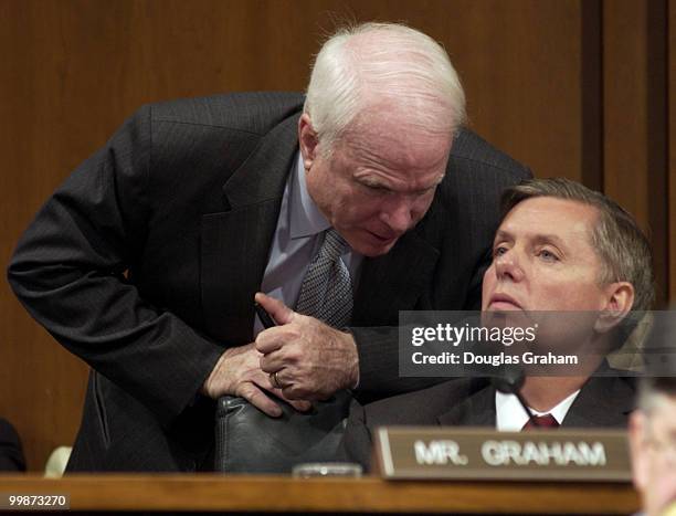 John McCain, R-AZ. And Lindsey Graham, R-S.C., talk during the full committee hearing on the allegations of mistreatment of Iraqi prisoners....