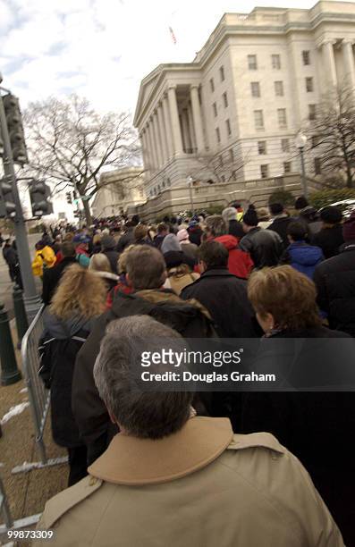 Large crowds leave the West Front of the U.S. Capitol after the 55th Presidential Inauguration. President George W. Bush was sworn into a second term...